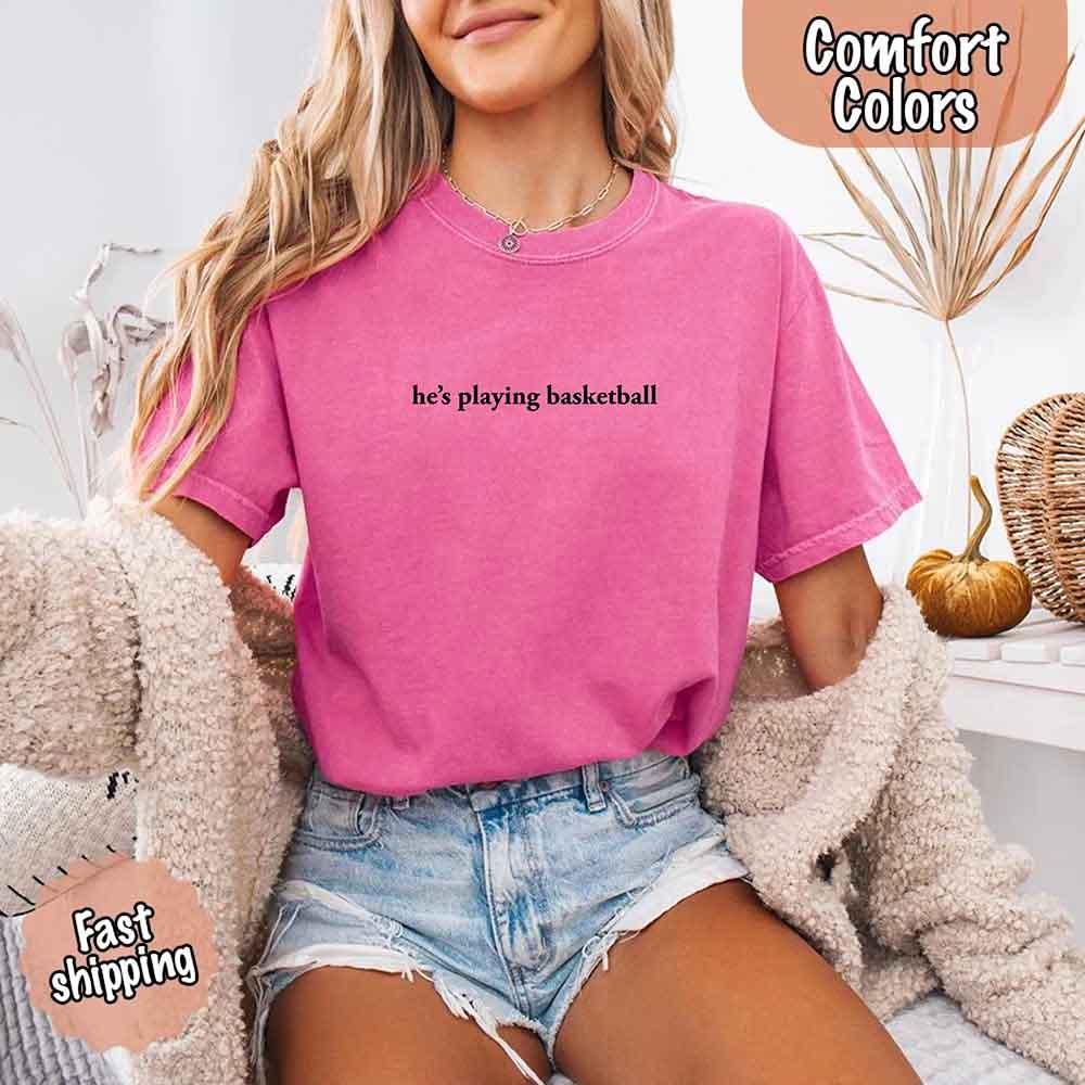 He’s Playing Basketball – Funny Sports Girlfriend Comfort Color Shirt for Women