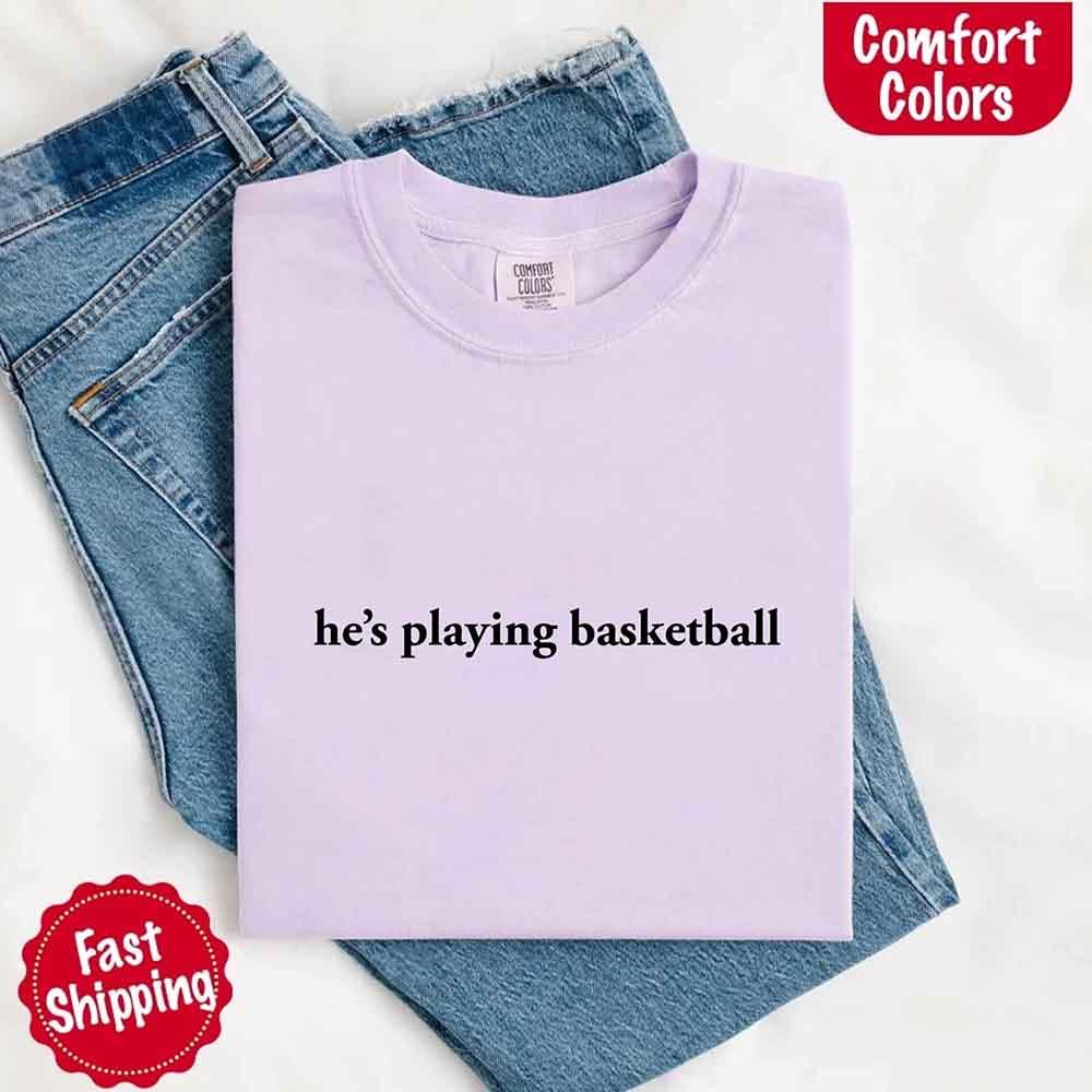 He’s Playing Basketball – Funny Sports Girlfriend Comfort Color Shirt for Women
