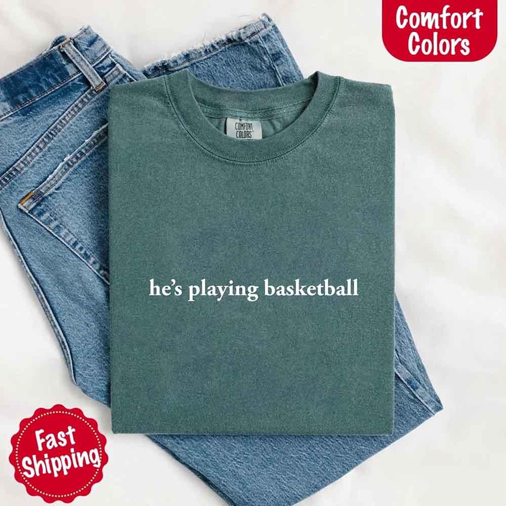 He’s Playing Basketball – Funny Sports Girlfriend Comfort Color Shirt for Women