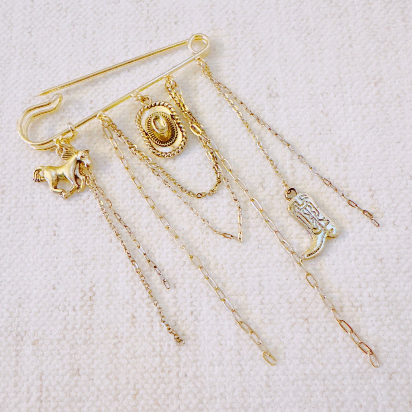 Western Charm Pin Brooch – Gold Safety Pin Style with Cowboy-Inspired Charms